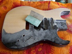sanding guitar